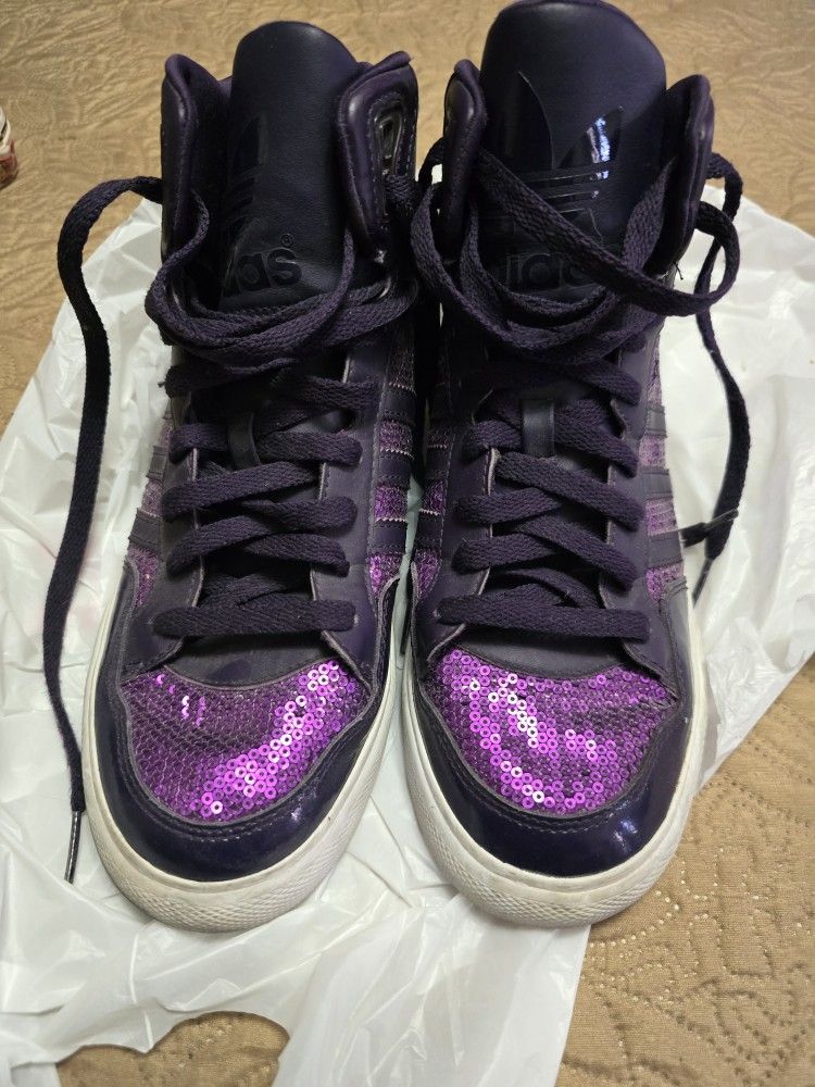 high-top adidas purple tennis sneakers womens/girls/teen, with beads, lace up.
size 8.5

Pick up East side El Paso by Lee Trevino and Pelicano 