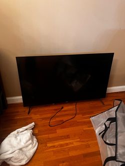 Large Flat Screen TV with Stand