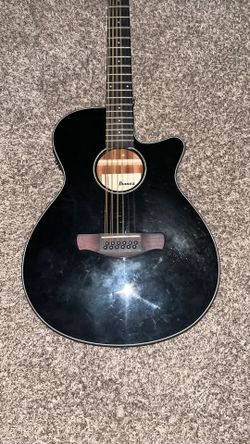 Ibanez aeg5012 (comes with capo, picks and paired strings and octave strings)