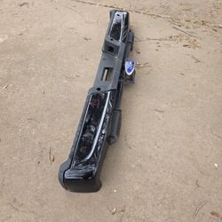 2021-2023 FORD F150 REAR BUMPER  WITH RECEIVER TOW HITCH AND SENSORS HOLES 
F21426