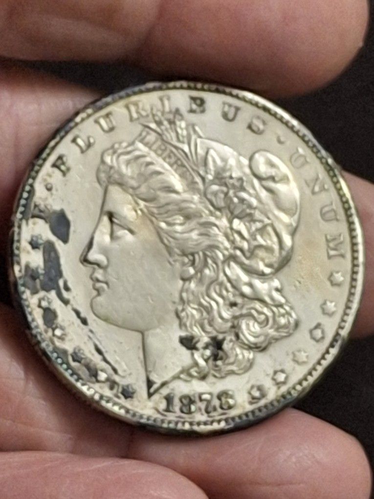 1878 S Morgan Silver Dollar With 7TF, Has A Stain Because Of The Way It Was Stored Otherwise It Looks In Excellent Condition- FIRM PRICE 