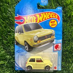 Yellow 1973 Honda N3 Hot Wheels diecast car #DiecastCars