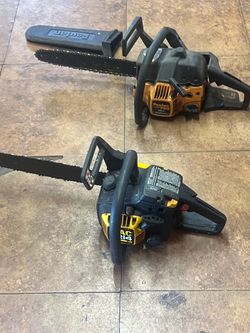 Two gas chain saws