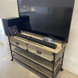 50” VIZIO 4K SMART UHD LED TV + SAMSUNG SOUNDBAR & WIRELESS SUBWOOFER + TV STAND + BRAND NEW LED LIGHTS