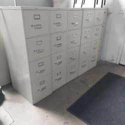 Rows Of Upright File Cabinets And More