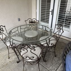 8 Piece Wrought Iron Table Set