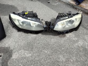 2011-2013 bmw 3 Series Coupe headlights xenon hid AFS with all the accessories and lights bulbs and headlight brackets OEM.