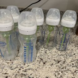 3 Glass And 3 Plastic Bottles