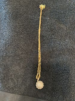10k  Gold Necklace With A Pink Diamond Pendant