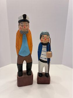 Vintage hand carved sea captain and first mate