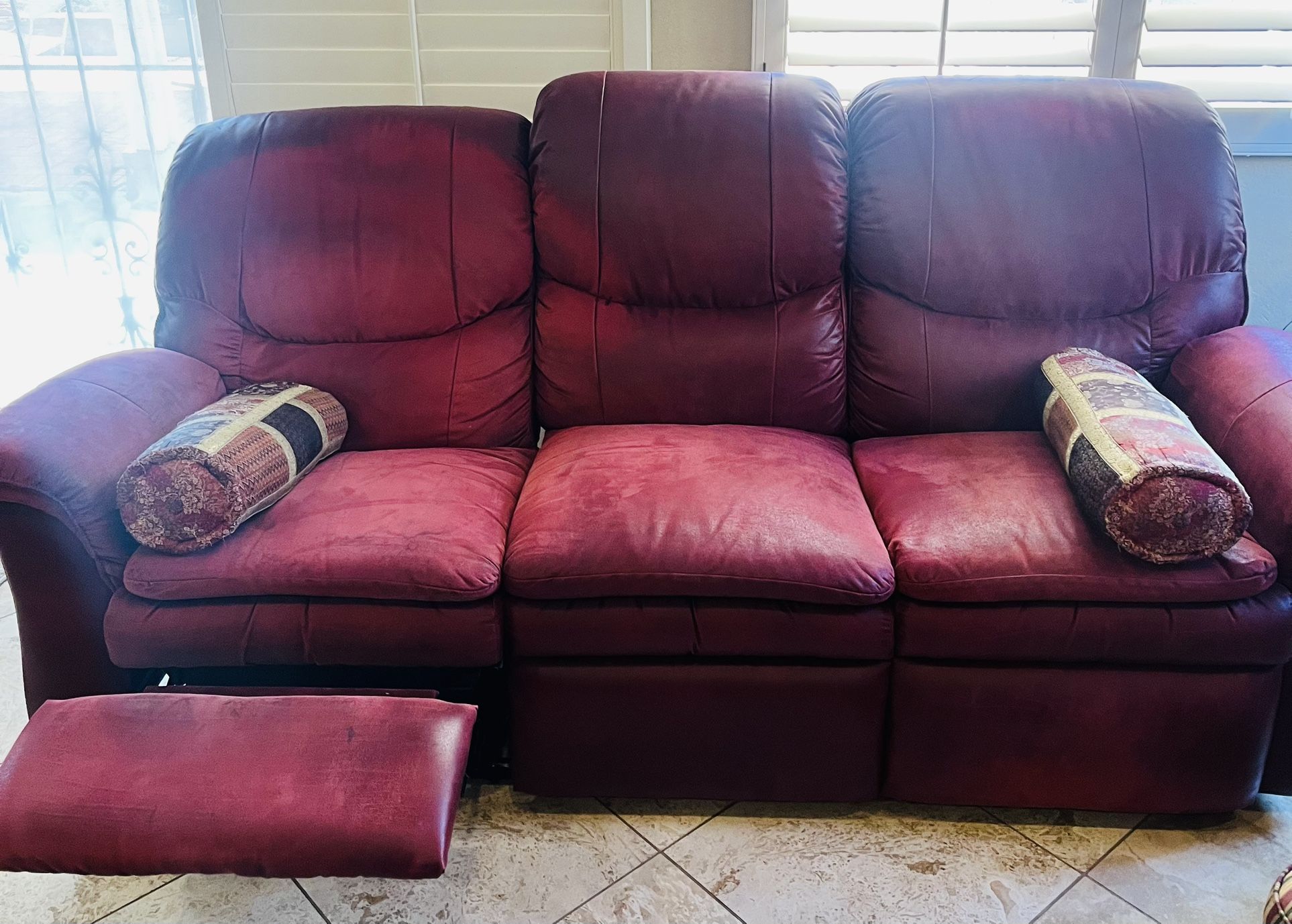 Burgundy, leather reclining sofa