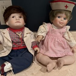The Danbury mint Michael, the doctor and Karen porcelain dolls by Larry Noble