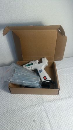 Like new glue gun with sticks in box