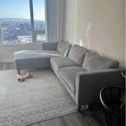 Living Spaces Cosmos 2-piece sectional sofa in grey fabric