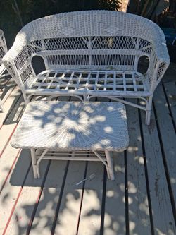 Wicker love seat and table