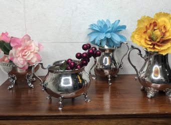 Beautiful creamers and sugars... repurposed as bud/flower vases or planters... check out my other offers too.