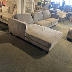 Sofa / Chaise: Left handed 2 Piece Charcoal Gray Sofa / Chaise As-Is (several stains on Chaise & Arm Rest) SKU TPNVT9