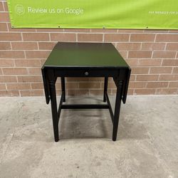 Table with drop leaves and drawer