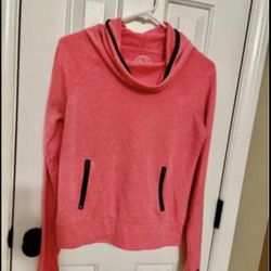 SO brand Girls Med size, soft feel, coral color outerwear. Hood, finger slits in sleeves. 2 zippers.