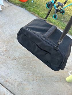 Pet carrier for a small dog or cat