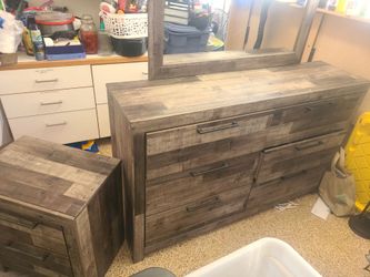 Bedroom set with queen bed dresser with mirror bedside table and headboard and baseboard footboard