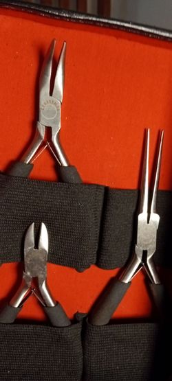 Craftsman needle nose stainless steel three piece and a nice leather cabinet