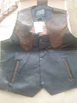 Brand new never been worn leather vest still have box