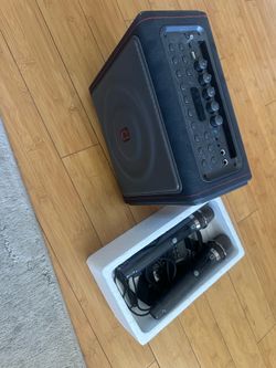 Kareoke machine with wireless microphones