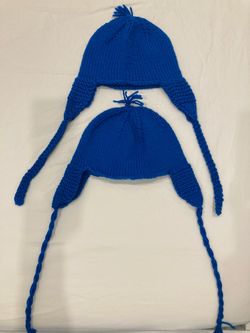 Kids hand knitted hats never worn both for $8