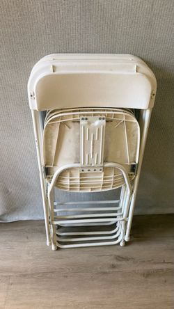 4 White Folding Chairs