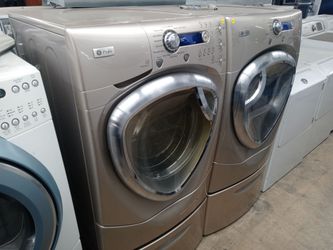 GE Profile tan front load washer and dryer set on pedestals - Free delivery