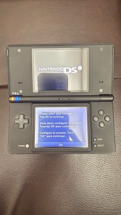 Nintendo DSi with 2 games