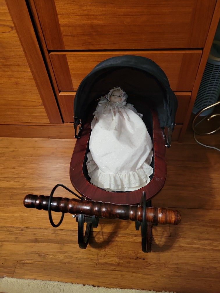 Antique Doll. Carriage