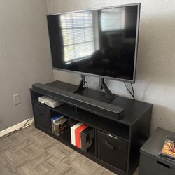 Tv stand and 32” insignia TV