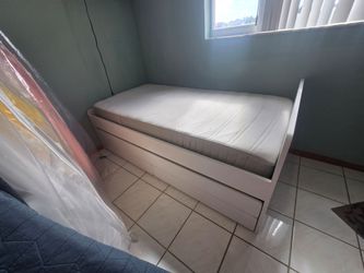 Twin bed with drawers