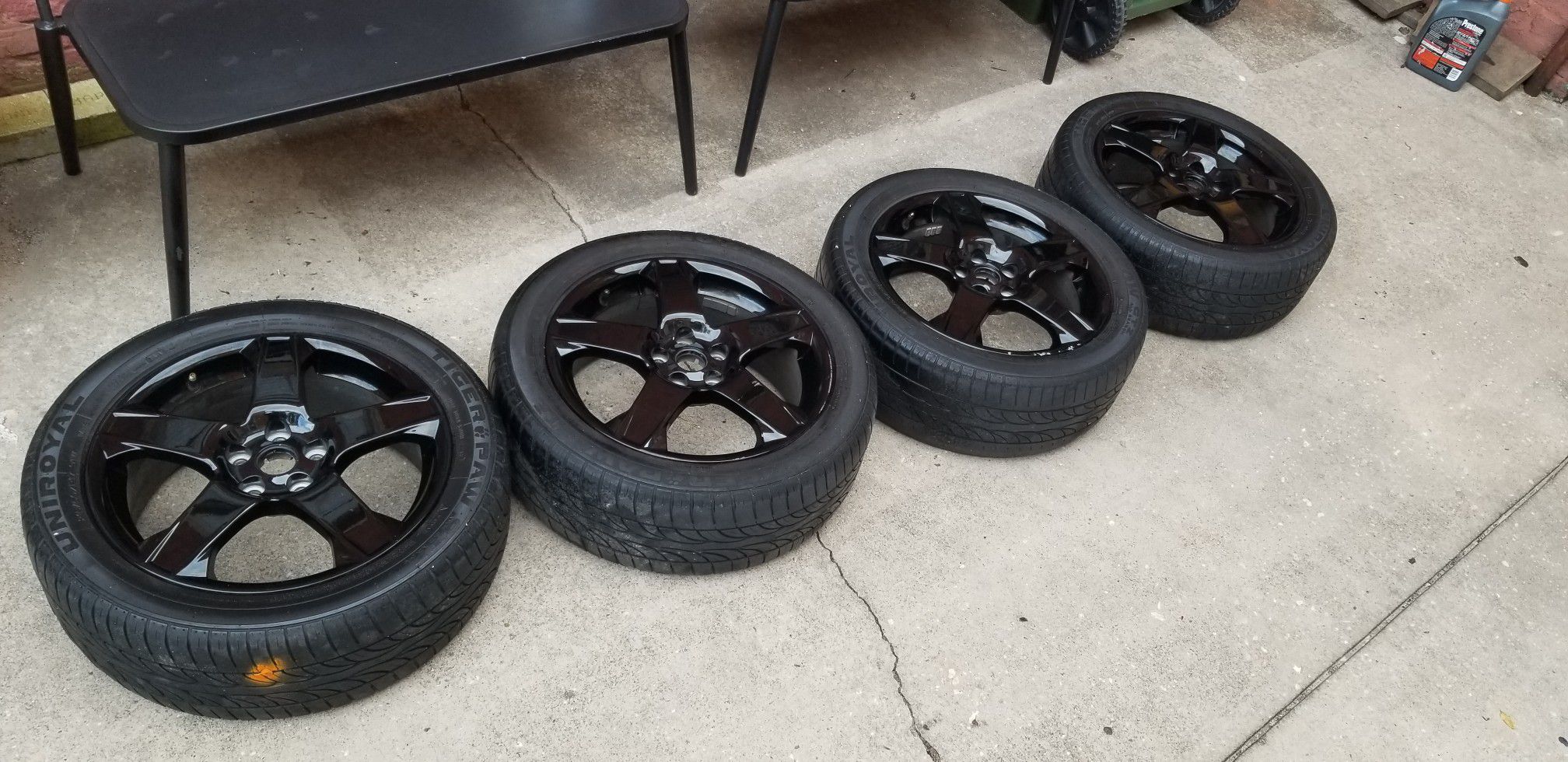 Black rims with tires