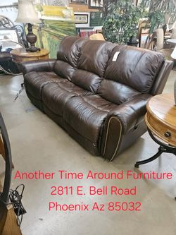Brown Leather Reclining Sofa with Nailhead Trim Another Time Around Furniture 
2811 E. Bell Road 
Phoenix Az 85032