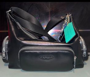 Coach Finn Crossbody Bag
With Pockets And Charms