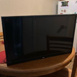 TCL Tv With Wall Mount Attached 