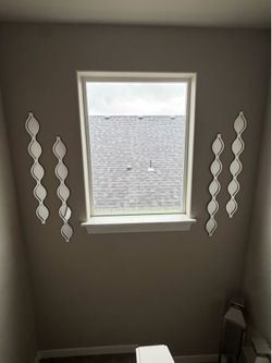 Set of 4 grey teardrop wall mirrors