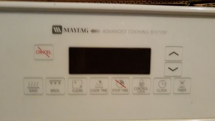 White Maytag built in self-cleaning oven.