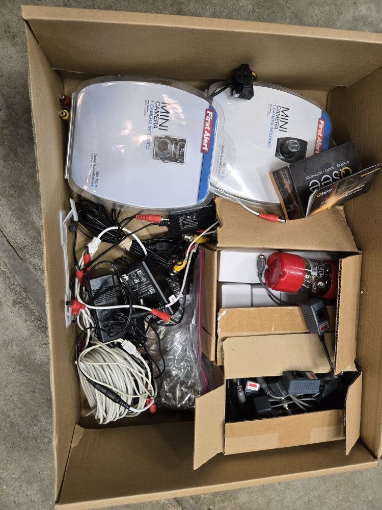 First Alert Mini Cameras, BNC connectors, baluns, cables, and power supplies.