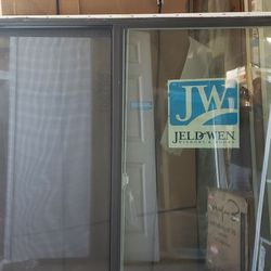 58x58 New Construction Windos Bronze Outside White Inside