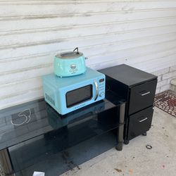 Teal Colored Microwave And Toaster