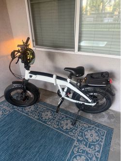 E bike + woman’s helmet