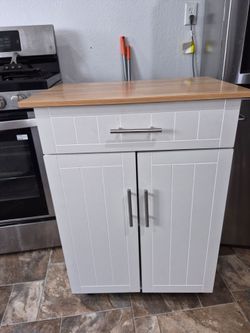 White Kitchen Cabinet with Butcher Block Top