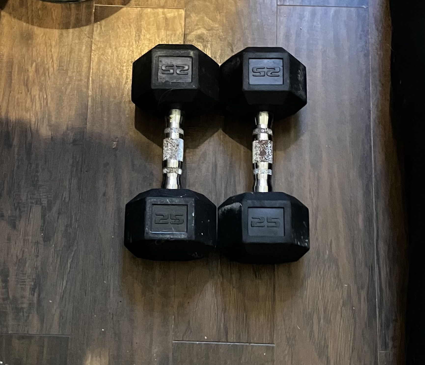 Two 25 pound dumb bells