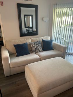 Cream Sofa and Storage Ottoman
