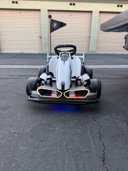 Go Kart eléctrico con asiento ajustable, kart de deriva BMW para niños de 6 a 12 años luces led