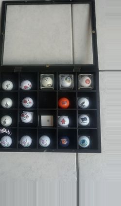 Golf ball collection with display case